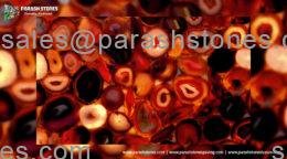 picture of red agate slab, tiles & surface in dark colour