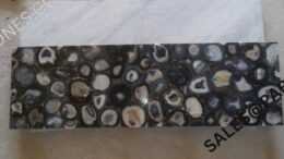 Polished Brazilian Black Agate tile with elegant banded design